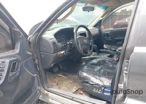 2002 Jeep Grand Cherokee Laredo z USA, uszkodzony, nr VIN 1J4GX48SX2C246198